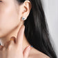Clous d'oreilles scintillants en moissanite