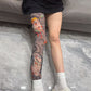 Manga de pierna elástica con estampado de tatuajes