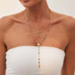 Colliers superposés avec croix dorées pour femme
