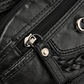 Sac bandoulière pour femme en simili cuir souple multi-poches
