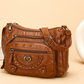 Sac bandoulière pour femme en simili cuir souple multi-poches