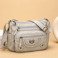 Sac bandoulière pour femme en simili cuir souple multi-poches
