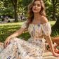 💃 Robe longue fleurie décolletée bustier avec découpes latérales 🌸✨