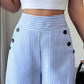 👖✨ PROMO LIMITÉE 50% DE RÉDUCTION ! Pantalon Taille Haute à Jambes Larges – Rayures Verticales Bleu & Blanc, Coupe Élégante, Bouts Décoratifs, Parfait pour Occasions Décontractées & Chic 🍃
