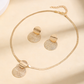 Parure collier & boucles d'oreilles chic moderne