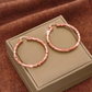 Boucles d'oreilles créoles texturées minimalistes pour femme – Bijou rond statement