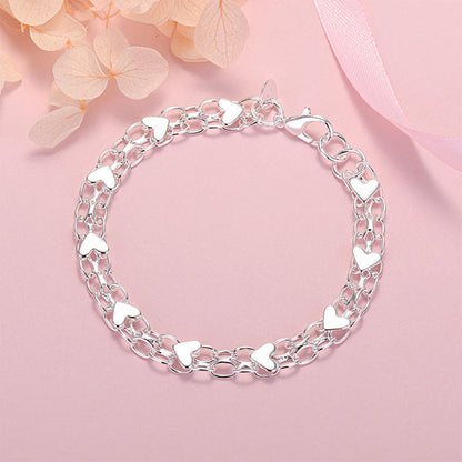 📢 50% DE RÉDUCTION ! ⏰ Bracelet à Breloques en Forme de Cœur – Double Chaîne Élégante & Fini Doré – Bijou Romantique et Polyvalent pour le Quotidien ou les Occasions Spéciales 💖✨